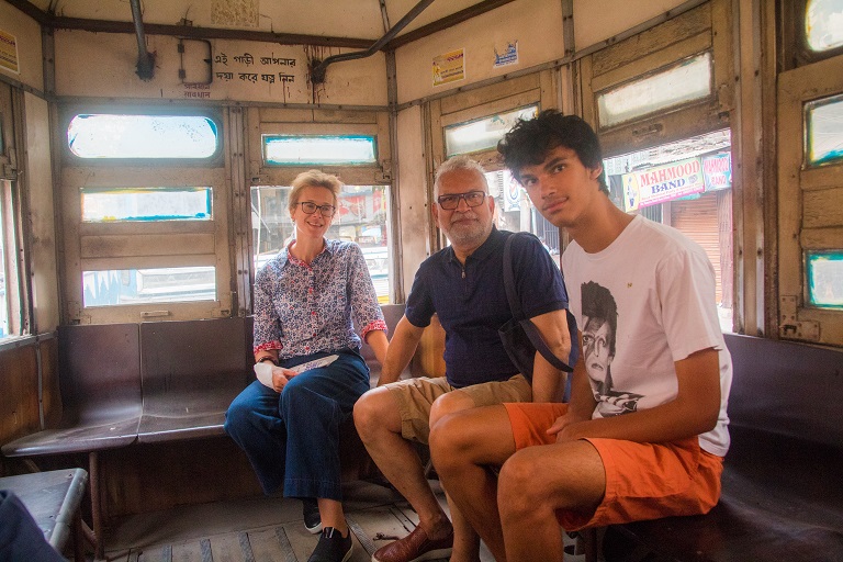 family enjoying tram ride with calcutta capsule