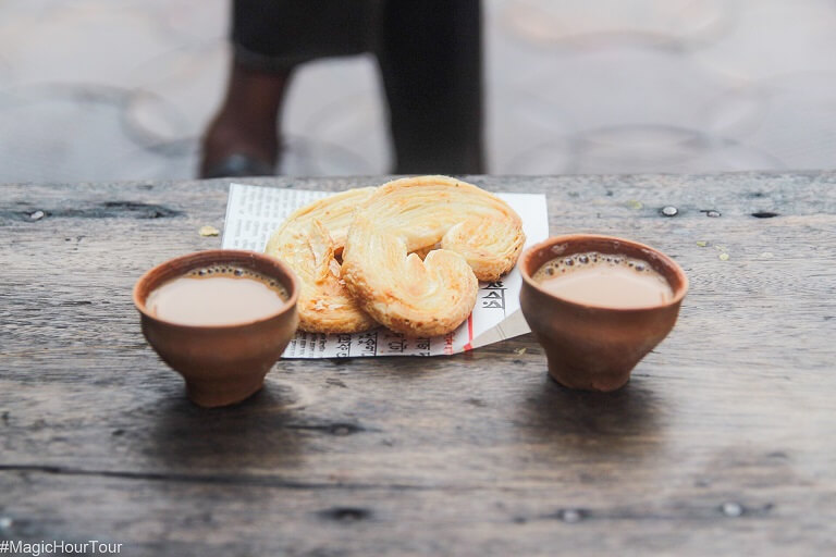 sipping on hot chai in earthen clay cups or bhaar on calcutta's best walking tour the magic hour tour.