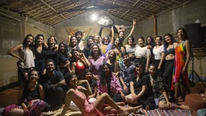 A joyful group photo of participants at the Sundarbans art retreat.
