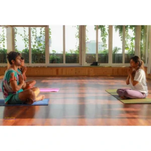 Yoga instructor conducting a soulful destressing Yoga session for guests travelling to Kolkata