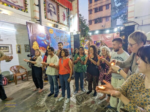 Travelers enjoying Diwali walk with Soham of calcutta capsule walking tours